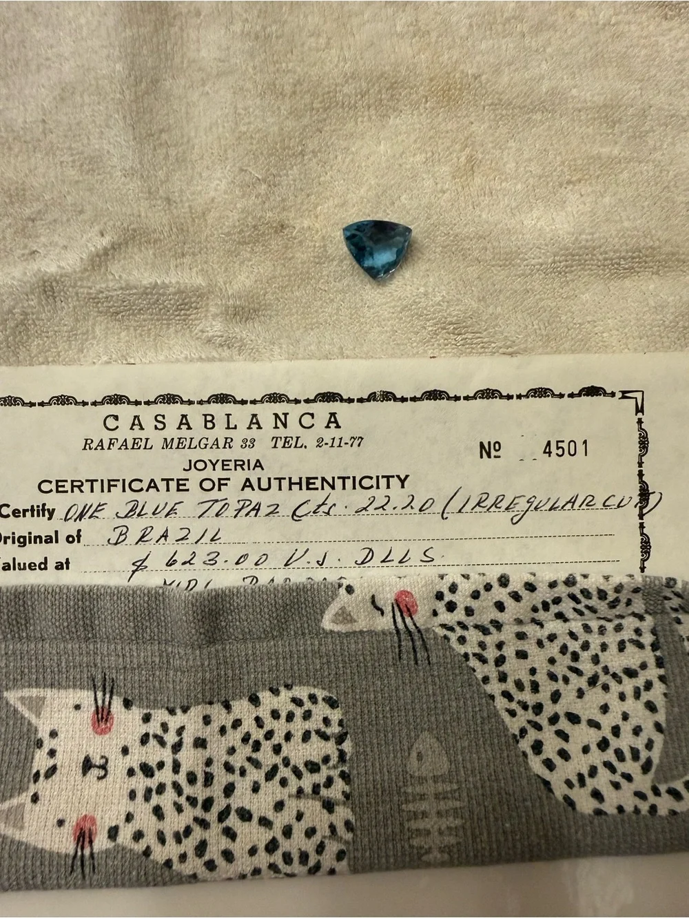 Blue Trillion-Cut blue topaz. 22 carat